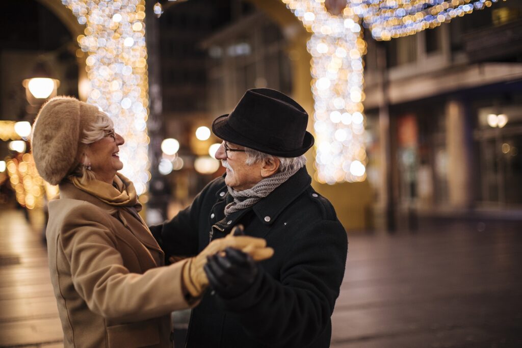 Senior couple dancing in new year